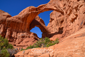 A side view of Double Arch at Arches National Park. Utah Fine Art Landscape Photography Print for Sale.