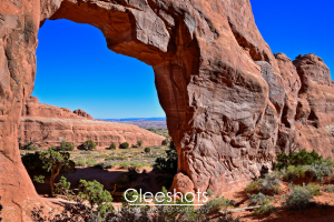 The view through the window of Pine Tree Arch in Arches National Park.  Utah Fine Art Landscape Photography Print for Sale.